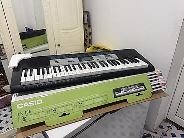 продать велик бу: CASIO LK-136 — обучающий электронный синтезатор с подсветкой клавиш — 1