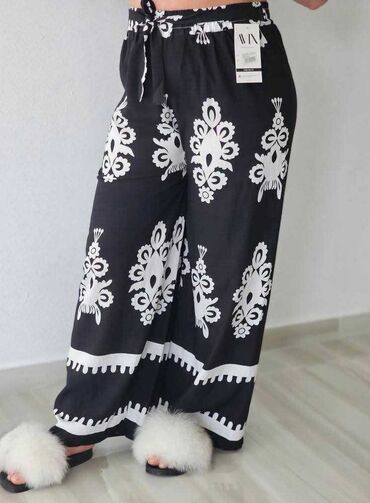 Pantalone: 06. Pantalone 
M/L i Xl/2xl — 27
