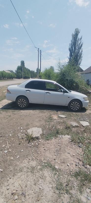 27 5: Mitsubishi Lancer: 2000 г., 1.5 л, Вариатор, Бензин, Седан — 4