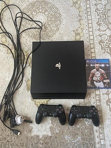PlayStation 4 Pro 1TB 12 oyun proşfka 2 pult original deyil Ustundə