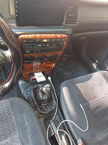 opel ehtiyat hisələri: Opel Vectra sedan – vişnə rəngi, 4 qapı, qara disklər, tonlu şüşələr — 6