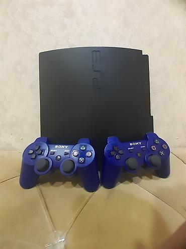 Video oyunlar və konsollar: PlayStation 3 Slim oyun konsolu dəsti - Model: PS3 Slim (yuxarıdan — 3