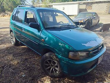 акумляторный гайкаверт: Mazda Demio: 1999 г., 1.3 л, Механика, Бензин, Хэтчбэк — 2