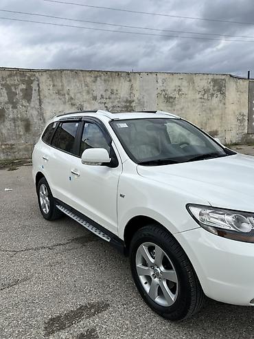 kia rio sukan: Hyundai Santa Fe: 2 l | 2009 il Krossover — 4