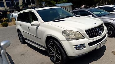 mersedes salon: Mercedes-Benz ML sinfi SUV Xüsusiyyətlər: - Kuzov: ağ rəng, 5 qapılı — 8