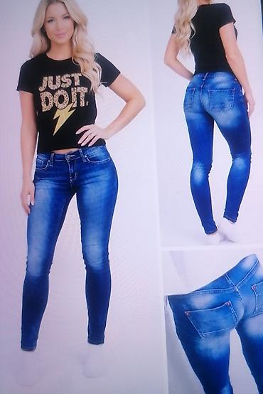Ženska odeća: Ženske skinny farmerke – plavi denim - Kroj: uske (skinny), visina — 1