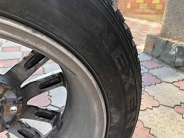 Транспорт: Зимняя шина Nexen Winguard (на направленном протекторе, указана — 7