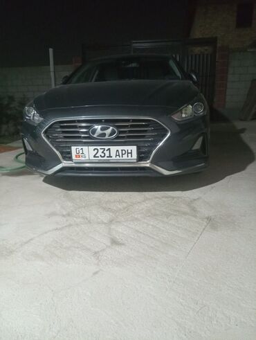 купить резину 235 55 r18 зима: Автомобиль Hyundai Sonata серого цвета с хромированной решеткой