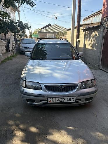 platform ok: Mazda Capella: 2000 г., 2 л, Механика, Бензин, Универсал — 1