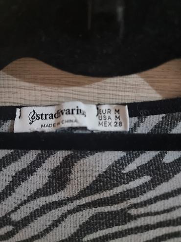 Džemperi, kardigani: Stradivarius ženski džemper/top sa zebrinim printom - Model: dug — 2