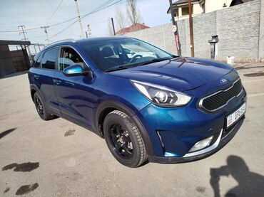 Kia: Автомобиль Kia Niro синего цвета.
Год 2020
Объем 1,6
Гибрид 

/