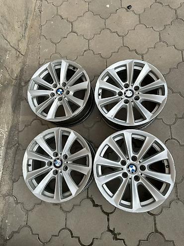 Транспорт: Комплект из 4 оригинальных литых дисков BMW. Подходит на многие модели — 1