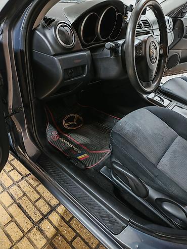 Mazda: Mazda 3 sedan - Kuzov: sedan, tünd-boz rəng - Mühərrik: benzin (detal — 14