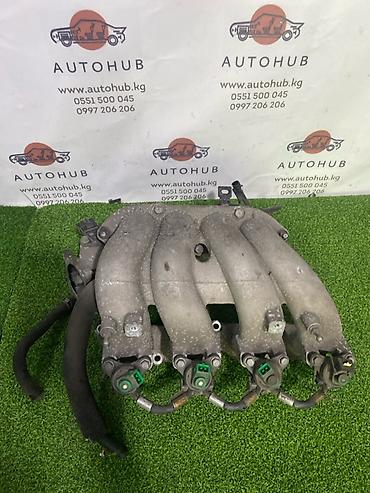 выпускной колектор: Коллектор выпускной Kia K5 JF 2.0 L4NA 2018 (б/у) — 1