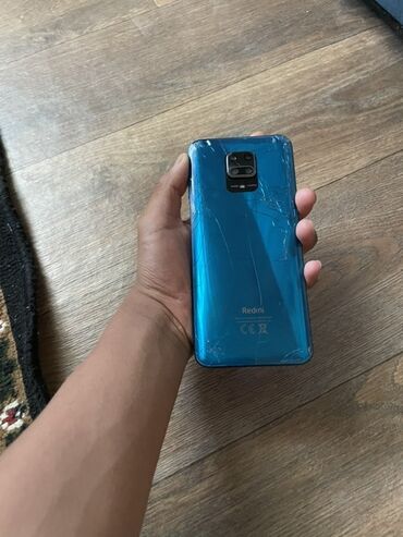 жаны телефон: Смартфон Redmi Note 9S в синем корпусе. Оснащен четверной камерой с
