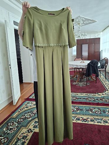 das sekilleri: Zeytun-yaşıl rəngdə uzun qadın donu. - Brend: Yakut - Model: maxi — 2