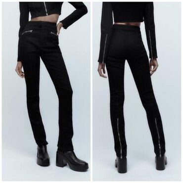 Atlama ipləri: Zara yan cibləri ve arxa eteklerde zamok olan, dar, uzun qara cins — 1