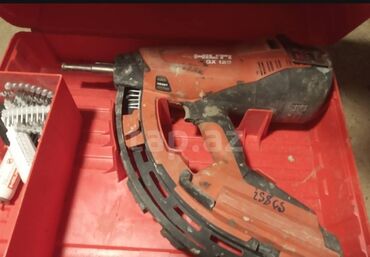 Boşqablar: Hilti GX 120 qazla işləyən çivələmə tapançası (Hilti gas nailer)