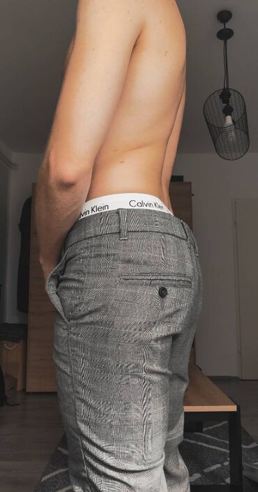 Pantalone: CHINO SLIM karirane muške pantalone 

House brand — 1