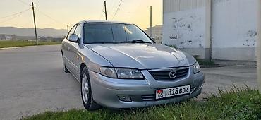 чехол на мопед: Mazda 626: 2000 г., 2 л, Механика, Бензин, Хэтчбэк — 2