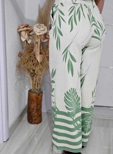 Pantalone: 06. Pantalone 
M/L i Xl/2xl — 11