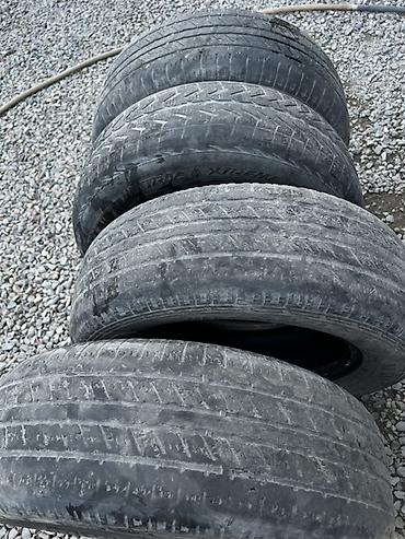 e34 4 4: Комплект автомобильных шин 215/65 R16 98H. Детали: - Типоразмер — 3