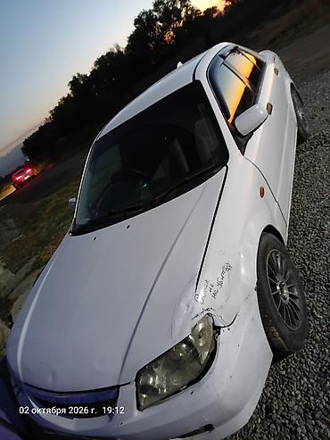 Mazda Familia: 2001 г., 1.3 л, Автомат, Бензин, Седан