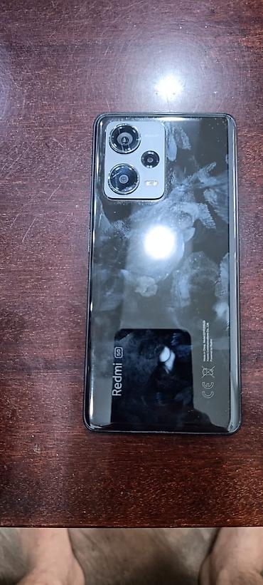nokia magic max 5g: Xiaomi Redmi (5G) smartfon - Model: Redmi 5G (arxa qapaqda “Redmi 5G” — 4