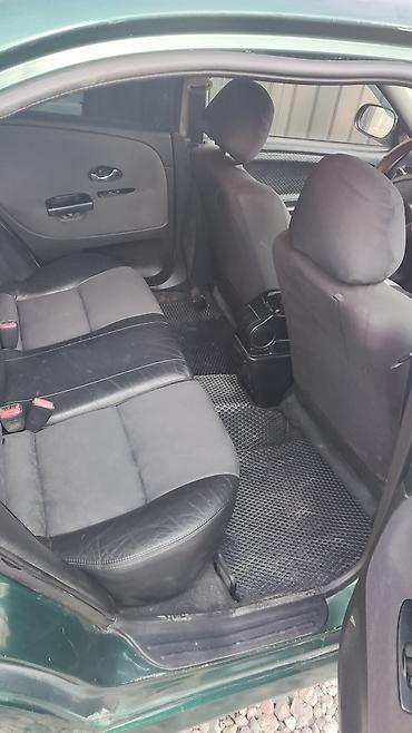 купить мазерати: Mitsubishi Carisma: 1999 г., Бензин, Седан — 7