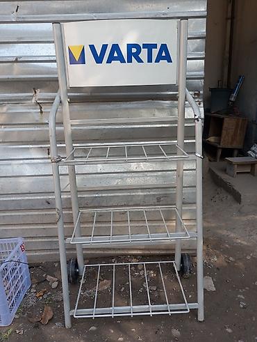 Металлический торговый стеллаж VARTA. - Напольная конструкция с