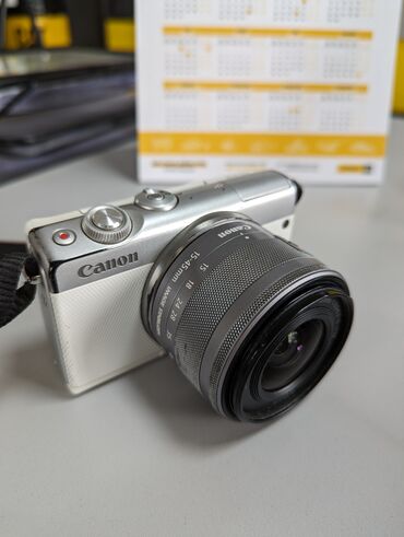 Фотоаппараты: Продаю Canon m100 с объективом 15-45мм, состояние хорошее. По корпусу