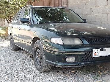 козырек 124: Mazda Capella: 1998 г., 1.9 л, Автомат, Бензин, Универсал — 1