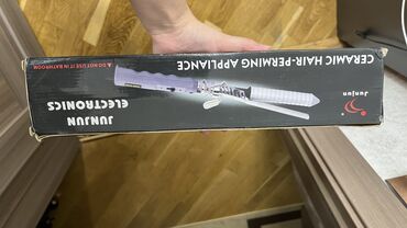 Epilyatorlar: Keramika saç buran Keramika örtüyü istiliyi bərabər paylayır, saçın
