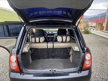 LIFAN: Lifan 320, 5 qapılı kompakt hetçbek. Xarici: - Qara rəng, xrom qapı — 7