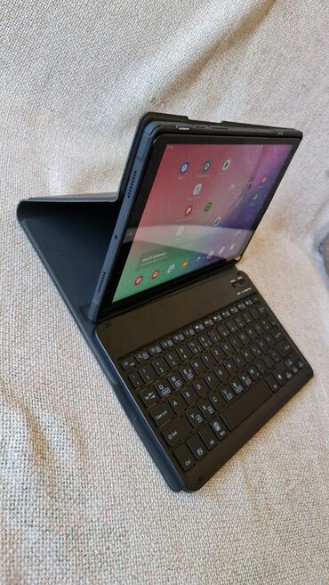 Tableti: Tablet kao nov nema mane, ima masku I blutut tastaturu,veliki 10 inca — 9