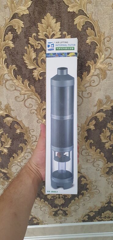 Akvarium aksessuar və ləvazimatları: Ağ rəngli silindrik korpusa malik akvarium xarici filtri. Qablaşdırma — 8