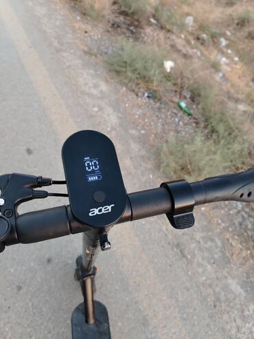 1 qram qizil: 500 manata satılır Acer electric scooter Es5 İşdənilib 25km gedir