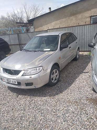 капот на нексия 2: Mazda Familia: 2001 г., Механика, Бензин, Хэтчбэк — 3