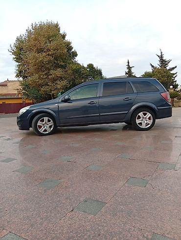 фургоны категории б: Opel Astra H Caravan (universal kuzov) - Kuzov: universal, 5 qapı - — 5