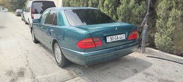 bmw 320 1996: Mercedes-Benz E 230: 2.3 l | 1996 il Sedan