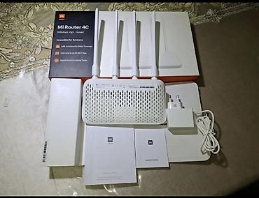 iphoni 11: Xiaomi Mi Router 4C – 300 Mbps Wi‑Fi router Xüsusiyyətlər: - 2.4 GHz — 3