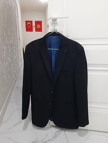 Брюки: Джоггеры с камуфляжным принтом и карманами карго, выполненные в — 11