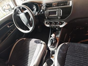 lizing avtomobiller: Kia Rio: 1.6 л | 2015 г. Седан — 5