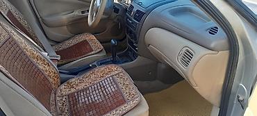 motor bmw: Nissan Sunny: 1.3 l | 2008 il Sedan — 9