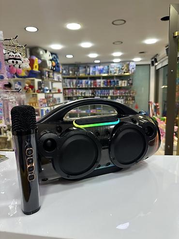 Elektronika: 120 Azn alinib 90 Azn satilir . NewRixing NR-8803W portativ karaoke — 2