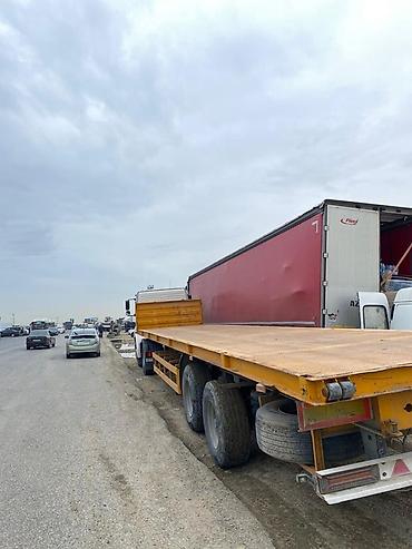 yükləyici traktor: Yük daşıma üçün yarımqoşqu – platforma tipli senetde Meydança qeyd — 1