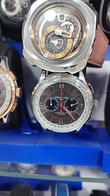 Breitling kişi xronoqraf saatları – Premier və Top Time üslubunda