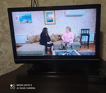ucuz kompüter qiymetleri: Sunny televizor satılır. Qara çərçivəli, masaüstü altlıqlı modeldir — 1
