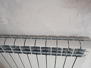 radyator: Ağ rəngli divar radiatoru - Bölməli konstruktor: çoxseksiyalı dizayn — 1