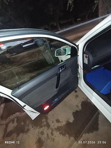 каропка поло: Volkswagen Polo: 2004 г., 1.4 л, Автомат, Бензин, Хэтчбэк — 9